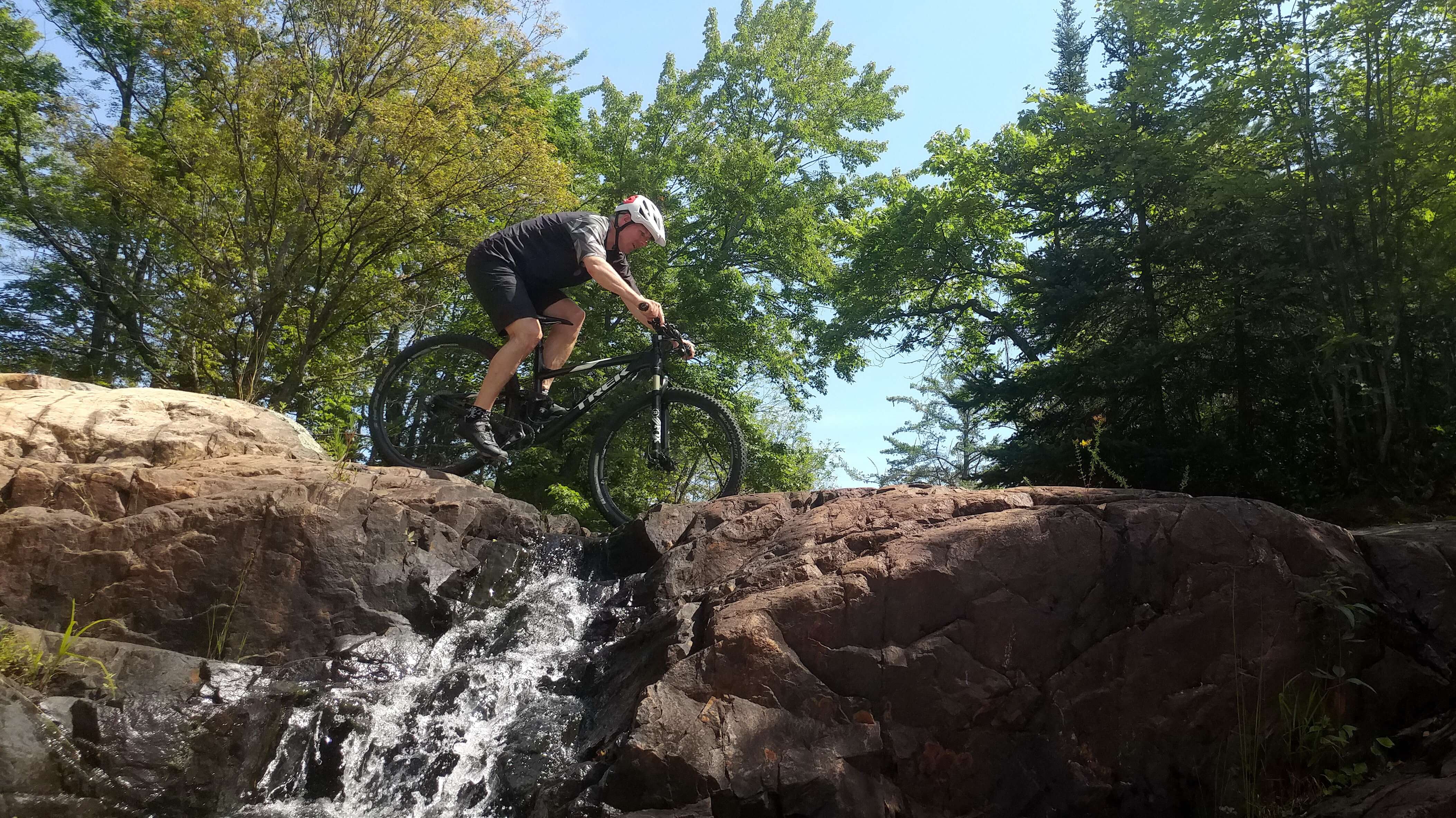 Riding above a waterfall